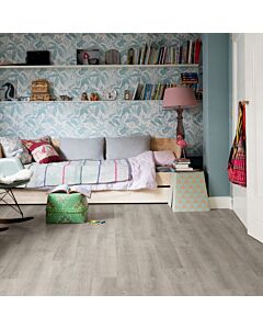 Parquet laminado de roble venecia gris de la marca quick-step de la serie eligna en un ambiente de habitación.
