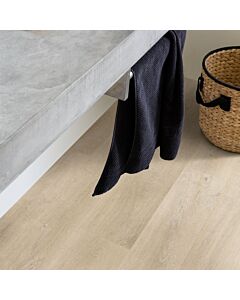 Parquet laminado de roble venecia beige de la marca quick-step de la serie eligna en un ambiente de habitación.