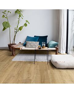 Parquet laminado de roble riva natural de la marca quick-step de la serie eligna en un ambiente de habitación.