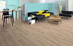 Parquet laminado de Roble Norhtland Miel MF4457 de Egger Megafloor de la serie M2 en un ambiente de habitación.