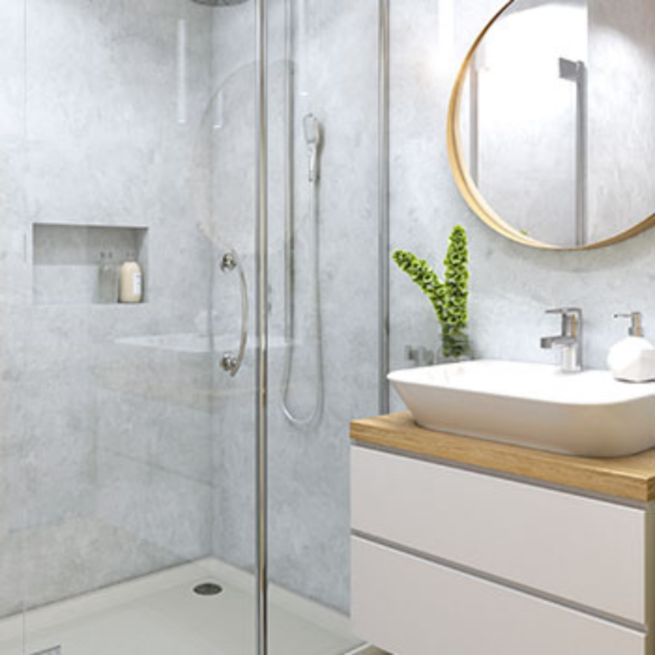 Revestimiento de pared de pvc en lamas con un diseño de piedra gris instalado en una cocina