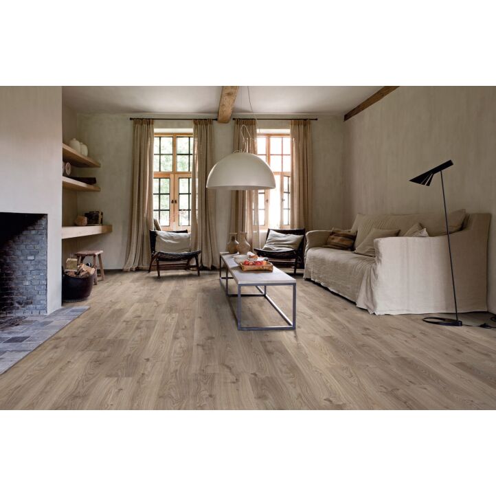 Parquet vinílico de la marca Quick-Step livyn Roble cabaña gris marrón BACL40026 de la serie Balance Click  en un ambiente de habitación.