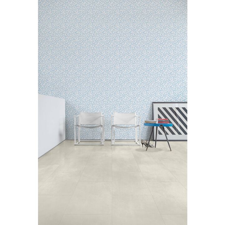 Parquet vinílico de la marca Quick-Step livyn Hormigón claro AMCL40049 de la serie Ambient Click en un ambiente de habitación.