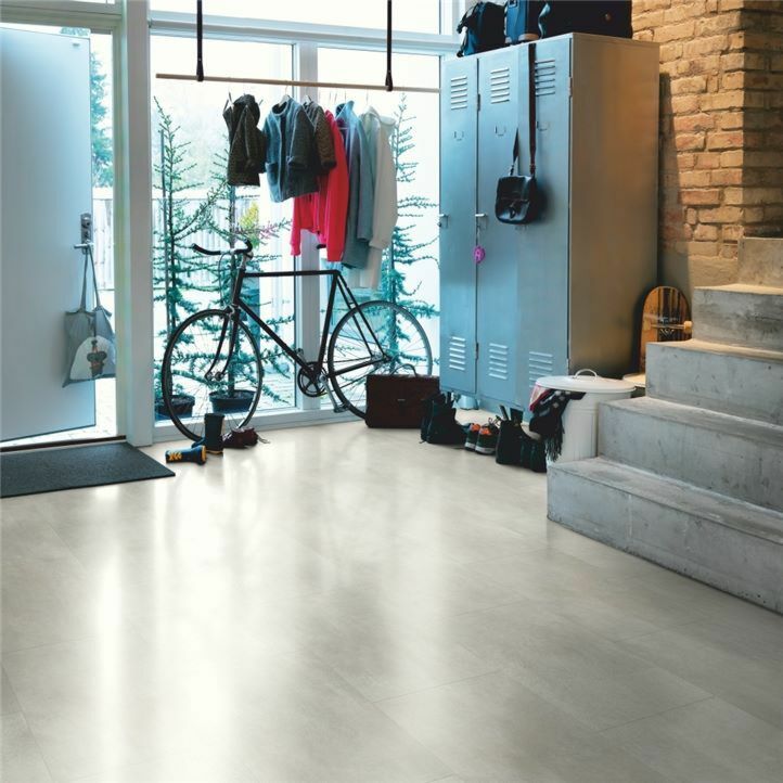 Parquet vinílico de la marca Pergo cemento metal oxidado V2120-40045 de la serie premium en un ambiente de habitación.
