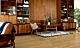 Parquet laminado roble señorial de la marca pergo de la serie living expression sensation resistente al agua superficialmente l0331-03370 en un ambiente de habitación.