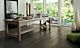 Parquet laminado de la marca pergo de la gama original excellence roble country L0234-03590 en un ambiente de habitación.