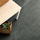 Parquet vinílico de la marca Pergo pizarra gris scivaro V3120-40034 de la serie optimum en un ambiente de habitación.