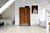 Parquet vinílico de la marca Quick-Step livyn roble cañón marrón BACP40127 de la serie Balance Click  Plus en un ambiente de habitación.