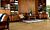 Parquet laminado roble señorial de la marca pergo de la serie original excellence sensation resistente al agua superficialmente l0231-03370 en un ambiente de habitación.