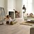 Parquet laminado de roble long island natural de la marca quick-step de la serie largo en un ambiente de habitación.