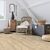 Parquet laminado de roble bosque beige MJ3545 de la marca Quick-Step de la serie Majestic en un ambiente de habitación.