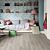 Parquet laminado de roble venecia gris de la marca quick-step de la serie eligna en un ambiente de habitación.