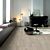 Parquet laminado de ROBLE VIEJO GRIS CLARO CLM1405 de la marca Quick-step de la serie CLASSIC en un ambiente de habitación.