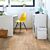Parquet laminado de ROBLE NATURAL MEDIANOCHE de la marca Quick-step de la serie CLASSIC en un ambiente de habitación.