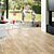 Parquet laminado de Roble clásico beige IMU1847 de la marca Quick-Step de la serie Impressive ultra en un ambiente de habitación.