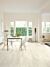 Parquet laminado de roble blanco charlotte CR3178 de la marca Quick-Step de la colección CREO en un ambiente de habitación.