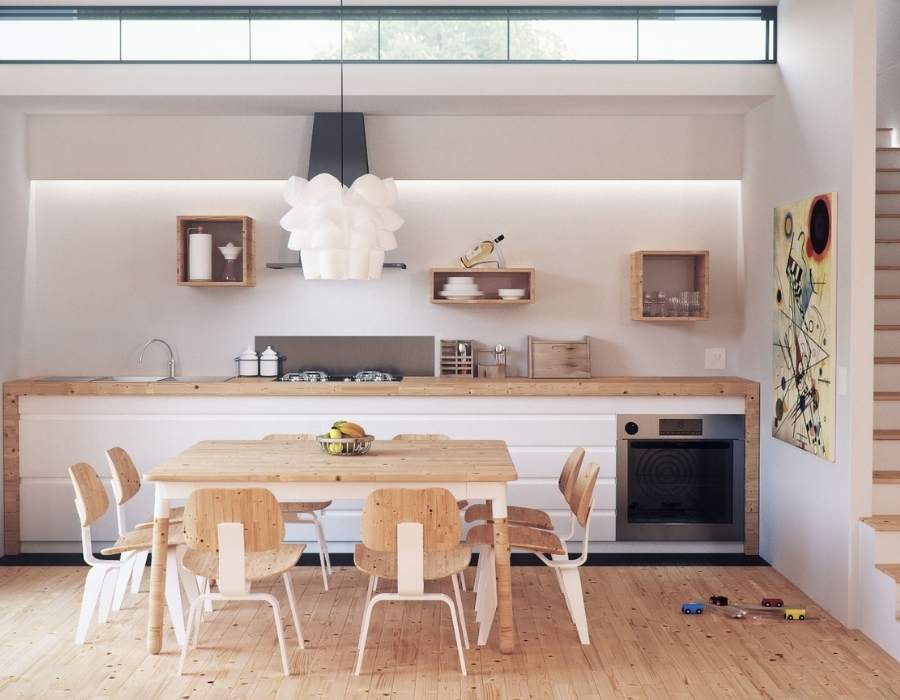 Cocina con suelo de madera color claro para dar más luminosidad